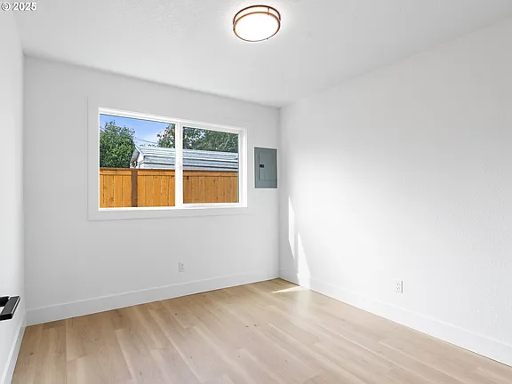 Second bedroom with window and natural light